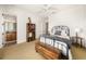 Bedroom with metal bed frame and adjacent bathroom at 4424 New Broad St, Orlando, FL 32814