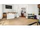 Home gym with weights, mat, and bar; open to living area at 4424 New Broad St, Orlando, FL 32814