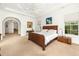 Bright and airy main bedroom with ensuite bathroom access at 4424 New Broad St, Orlando, FL 32814