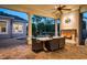 Outdoor patio with fireplace and dining area at 4424 New Broad St, Orlando, FL 32814