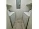 Laundry closet with side-by-side washer and dryer at 5501 Rosebriar Way # B105, Orlando, FL 32822