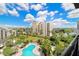 Complex features a kidney-shaped pool with a spa at 6165 Carrier Dr # 1803, Orlando, FL 32819