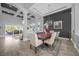 Elegant dining room with chandelier and access to the kitchen at 820 Duff Dr, Winter Garden, FL 34787