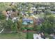 Aerial view of the property showing the home and the expansive surrounding lot outlined in red at 1161 Roxboro Rd, Longwood, FL 32750