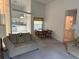 Cozy living area featuring comfortable seating, natural light, and an open floor plan at 1161 Roxboro Rd, Longwood, FL 32750