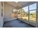 Relaxing screened-in porch with views of the private backyard and mature landscaping at 1161 Roxboro Rd, Longwood, FL 32750