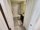Bathroom with tub, shower, and granite vanity at 11743 Stein St, Orlando, FL 32832