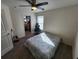 Bedroom with queen bed and access to storage area at 11743 Stein St, Orlando, FL 32832