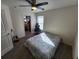 Bright bedroom with a queen bed and walk-in closet at 11743 Stein St, Orlando, FL 32832