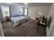 Spacious bedroom with king-size bed and sitting area at 11743 Stein St, Orlando, FL 32832