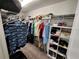 Large walk-in closet with shelving and hanging rods at 11743 Stein St, Orlando, FL 32832