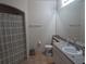 Neutral bathroom with shower, large mirror, and vanity at 1341 Arbor Vista Loop # 113, Lake Mary, FL 32746