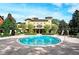 Community pool with building and landscaping in background at 1341 Arbor Vista Loop # 113, Lake Mary, FL 32746