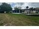 House exterior with a screened patio and fountain at 1641 Lake Marion Dr, Apopka, FL 32712