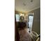 Elegant bathroom with dark vanity and glass block window at 1641 Lake Marion Dr, Apopka, FL 32712