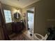 Elegant bathroom with dark vanity and glass block window at 1641 Lake Marion Dr, Apopka, FL 32712