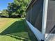 Side view of a single story house with screened patio at 1641 Lake Marion Dr, Apopka, FL 32712