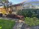Tan house exterior with a sunroom and manicured landscaping at 1641 Lake Marion Dr, Apopka, FL 32712