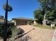 Single-story house with attached garage and brick driveway at 1641 Lake Marion Dr, Apopka, FL 32712