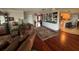 Open living room with hardwood floors and built-in shelving at 1641 Lake Marion Dr, Apopka, FL 32712