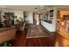 Open living room with hardwood floors and built-in shelving at 1641 Lake Marion Dr, Apopka, FL 32712