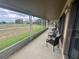 Spacious screened porch with view of the backyard at 1641 Lake Marion Dr, Apopka, FL 32712