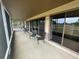 Spacious screened porch with comfy seating, overlooking the backyard at 1641 Lake Marion Dr, Apopka, FL 32712