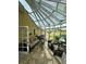 Bright sunroom with skylights and access to backyard at 1641 Lake Marion Dr, Apopka, FL 32712