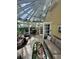 Spacious sunroom with ample natural light and comfortable seating at 1641 Lake Marion Dr, Apopka, FL 32712