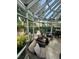 Sunroom with skylights and comfortable seating area at 1641 Lake Marion Dr, Apopka, FL 32712