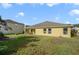 Large backyard with grassy area and partial view of house at 218 Black Springs Ln, Winter Garden, FL 34787