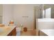 Bathroom with shower, tub, and single sink vanity at 218 Black Springs Ln, Winter Garden, FL 34787