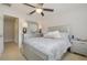 Bedroom with a queen bed, ceiling fan and dresser at 218 Black Springs Ln, Winter Garden, FL 34787
