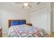 Cozy bedroom with a double bed and large closet at 218 Black Springs Ln, Winter Garden, FL 34787