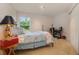 Charming bedroom with a wooden bed frame and blue bedding at 218 Black Springs Ln, Winter Garden, FL 34787