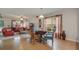 Casual dining area with a small table and chairs near the living room at 218 Black Springs Ln, Winter Garden, FL 34787