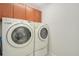 Bright laundry room with washer and dryer at 218 Black Springs Ln, Winter Garden, FL 34787