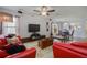 Open concept living room with views into the dining area at 218 Black Springs Ln, Winter Garden, FL 34787