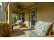 Covered porch with seating area and ceiling fan at 218 Black Springs Ln, Winter Garden, FL 34787