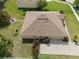 Aerial view highlighting the back of the property, with its private yard, patio area, and landscaped greenery at 218 Black Springs Ln, Winter Garden, FL 34787