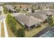 Aerial view showcasing home's backyard and neighborhood setting at 2714 Stargrass Cir, Clermont, FL 34715