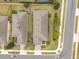 Overhead view of two homes and surrounding neighborhood at 2714 Stargrass Cir, Clermont, FL 34715