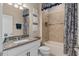Clean bathroom with granite countertop, bathtub, and shower at 2714 Stargrass Cir, Clermont, FL 34715