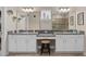 Spacious bathroom boasting double sinks, granite counters, and a walk-in shower at 2714 Stargrass Cir, Clermont, FL 34715