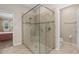 Large walk-in shower with glass enclosure and tiled walls at 2714 Stargrass Cir, Clermont, FL 34715