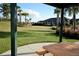 Relaxing dog park with a shaded picnic table at 2714 Stargrass Cir, Clermont, FL 34715