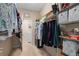 Well-organized walk-in closet with ample shelving and hanging space at 2714 Stargrass Cir, Clermont, FL 34715