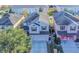 Two-story house, two-car garage, and landscaped yard at 2746 Stanwood Dr, Kissimmee, FL 34743