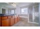 Bathroom with double vanity, tub, and shower at 2746 Stanwood Dr, Kissimmee, FL 34743