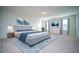 Spacious main bedroom with carpeted floor and stylish decor at 2746 Stanwood Dr, Kissimmee, FL 34743